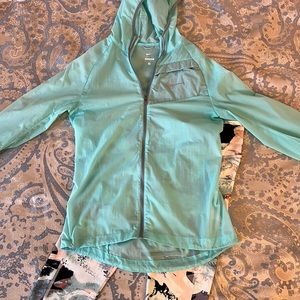 Women’s light green Impossibly Light size small Nike running jacket